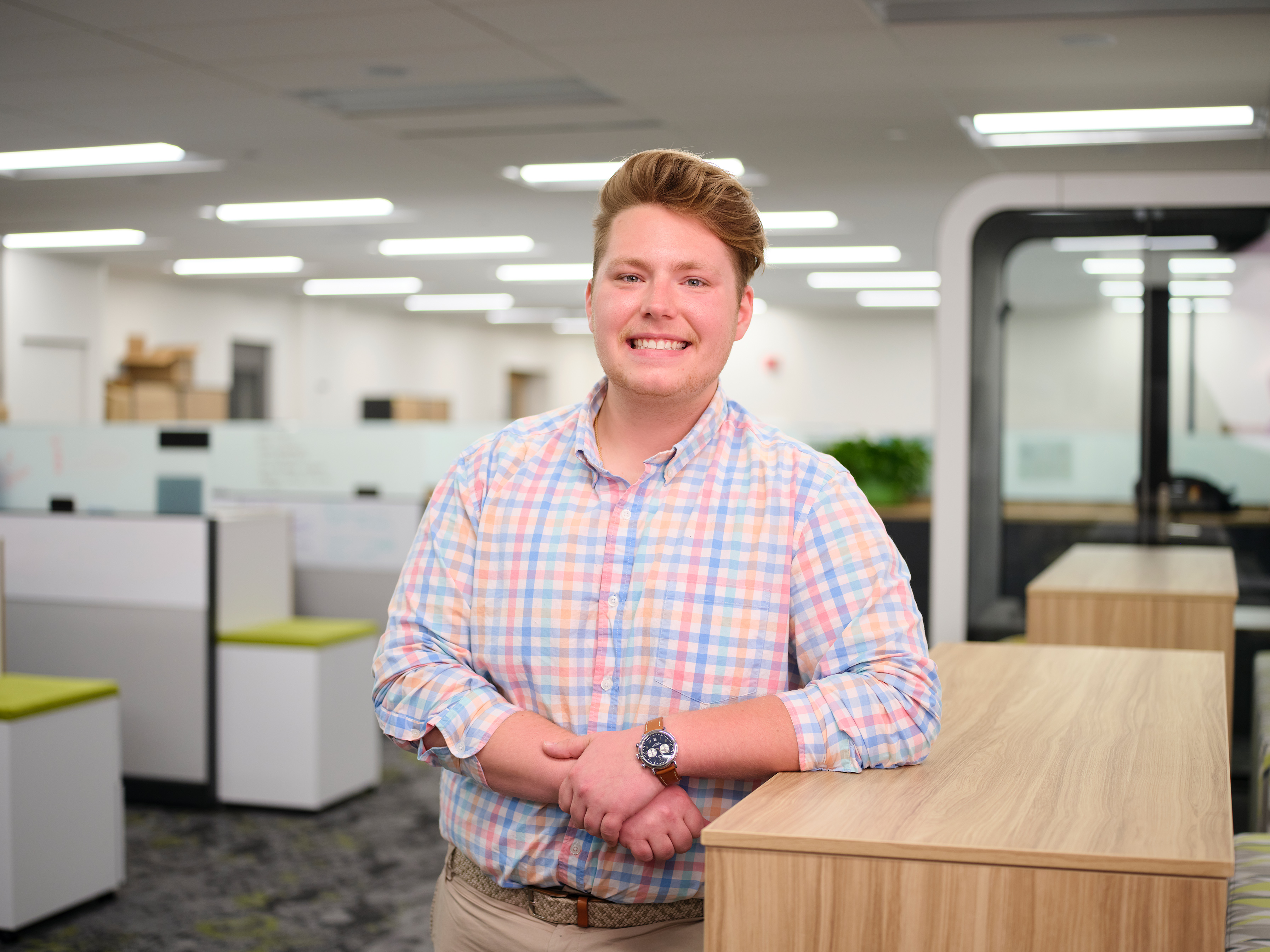 a man standing in an office