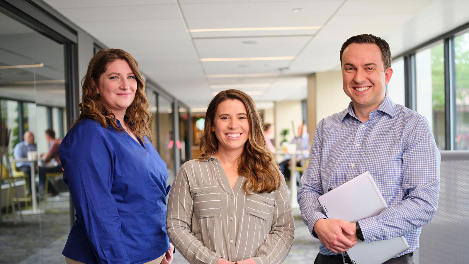 a group of people standing in a hallway