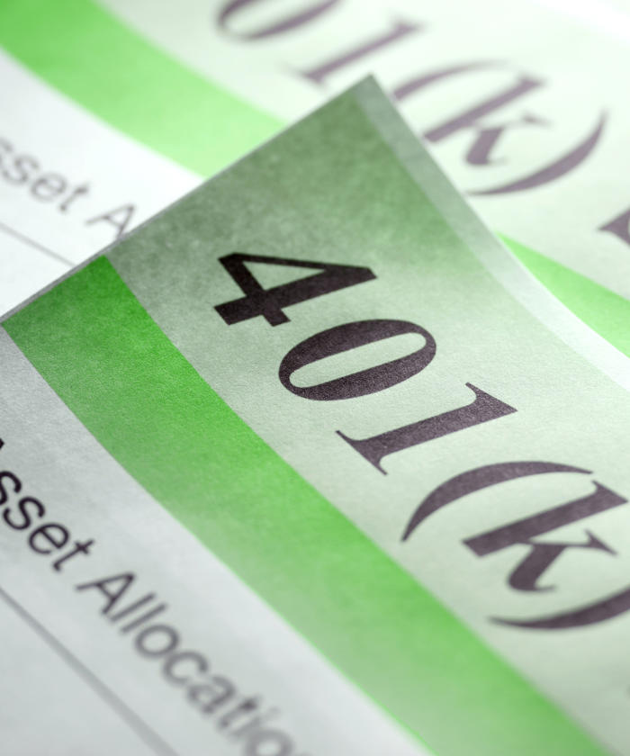 a close up of a paper with the words 401(k)