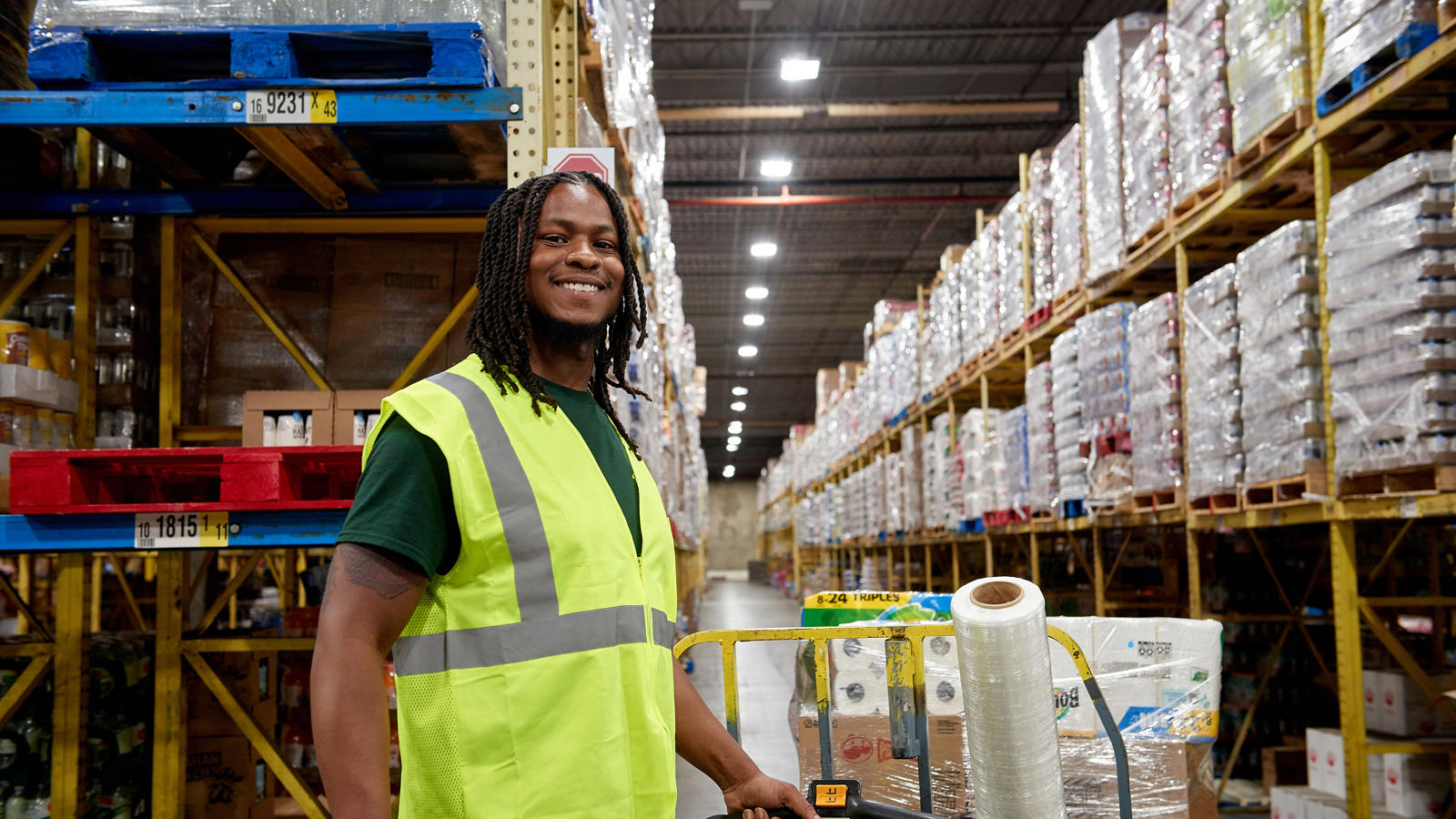 a man in a SpartanNash warehouse