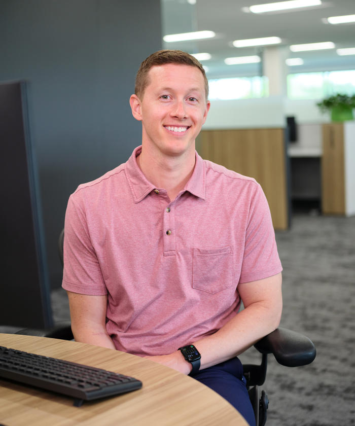 a man sitting at a desk