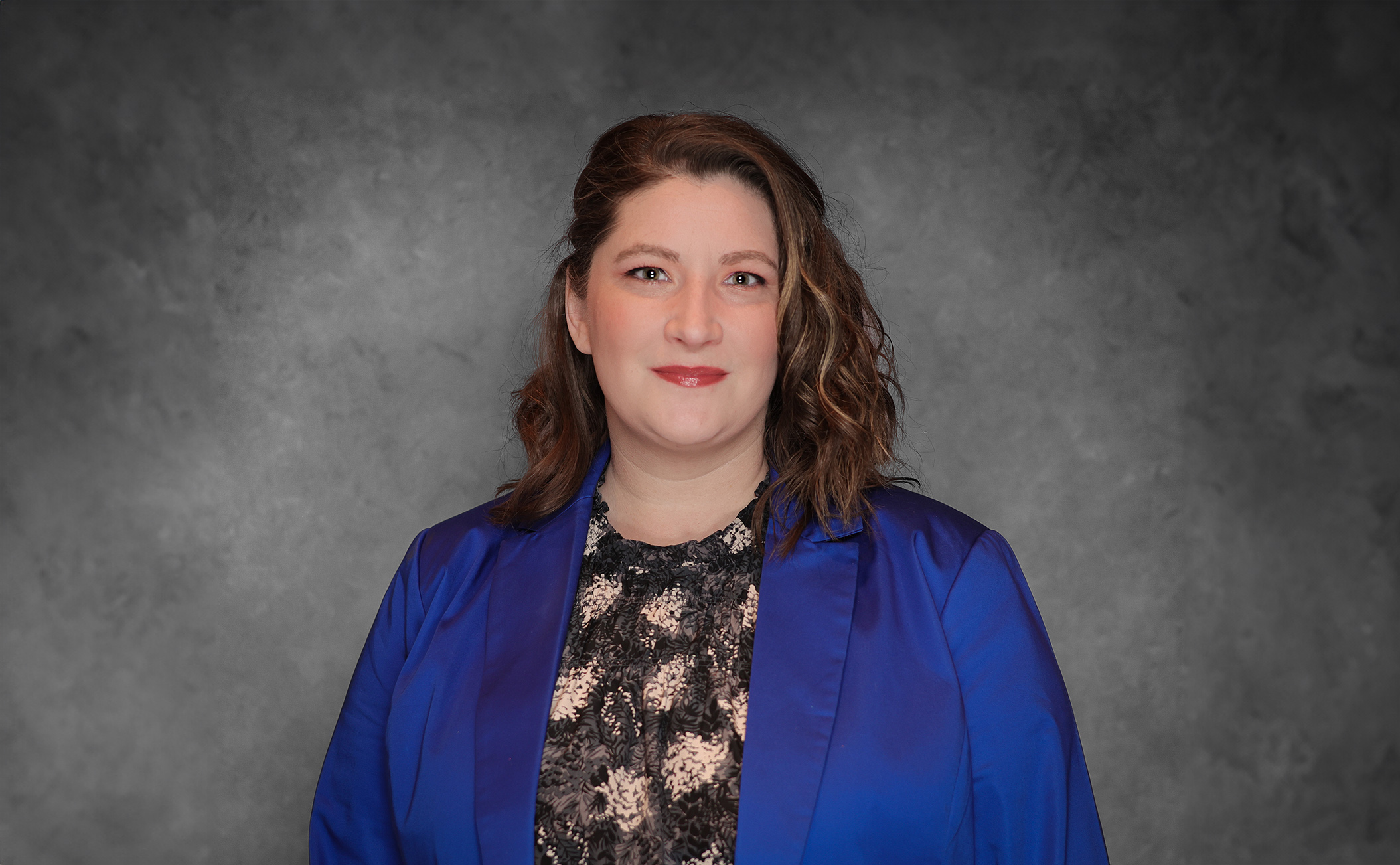 a woman in a blue jacket