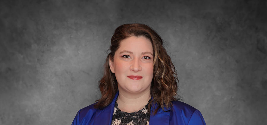 a woman in a blue jacket