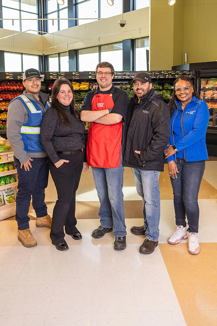 a group of people posing for a photo