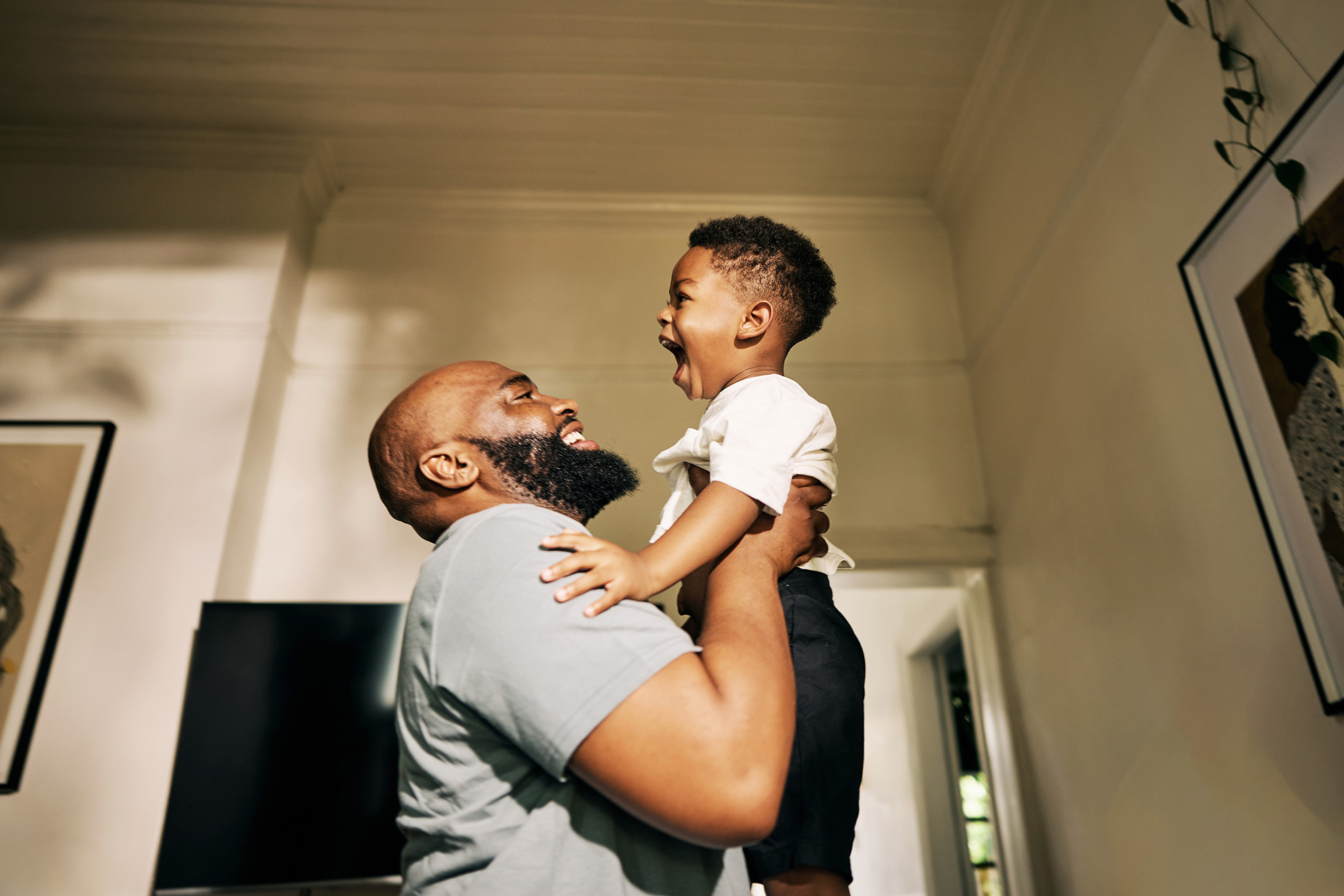 a man holding a child