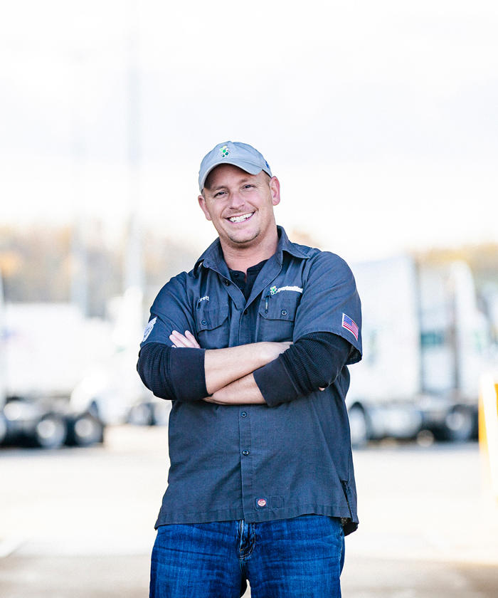 a man standing with his arms crossed